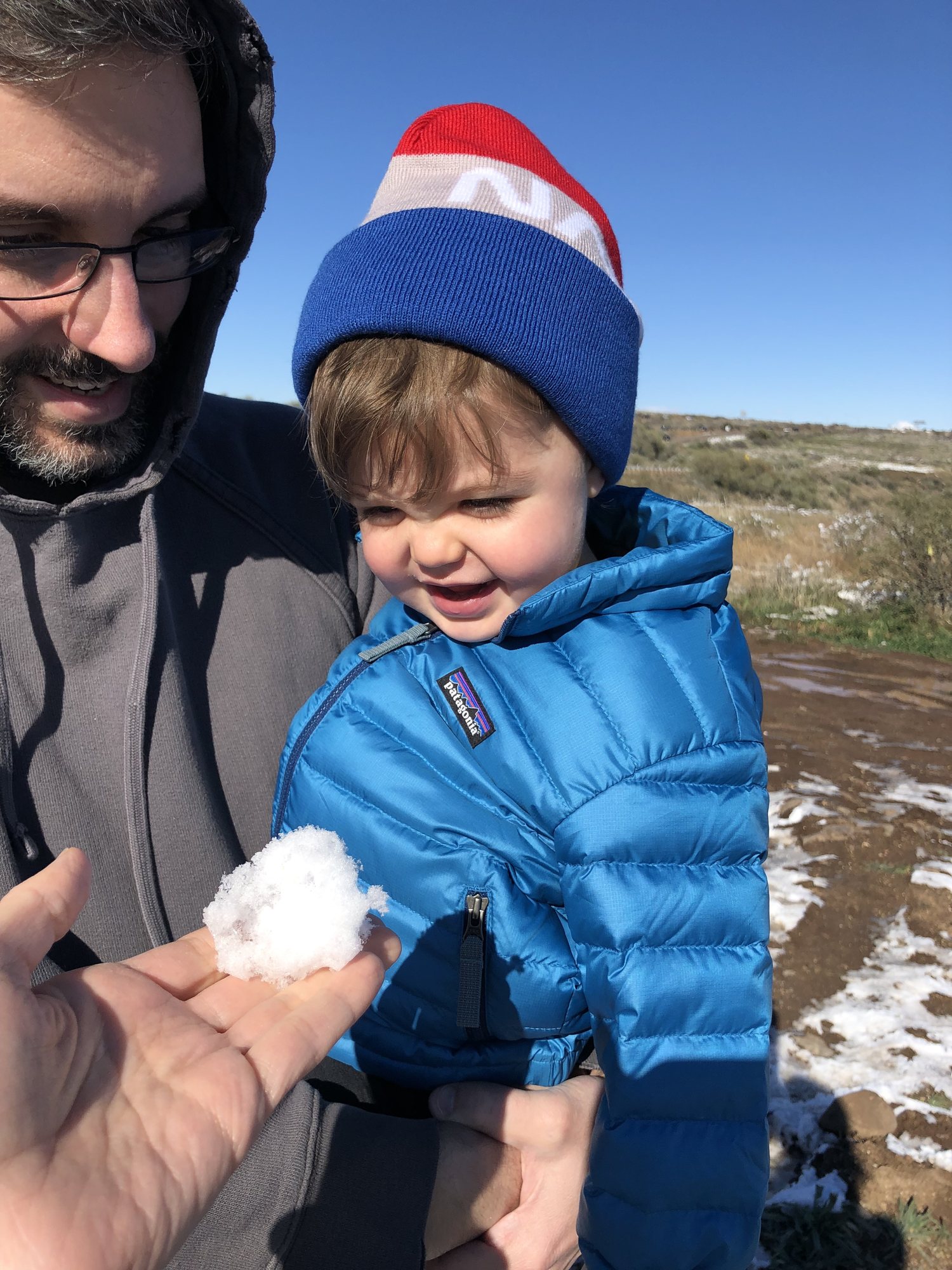 We drove an hour to see some snow (and mud). Ben like the snow but DID NOT want to touch it.