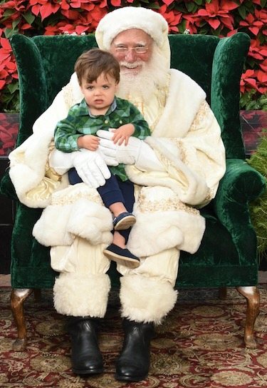 Not so happy to see Santa Claus. LOL.