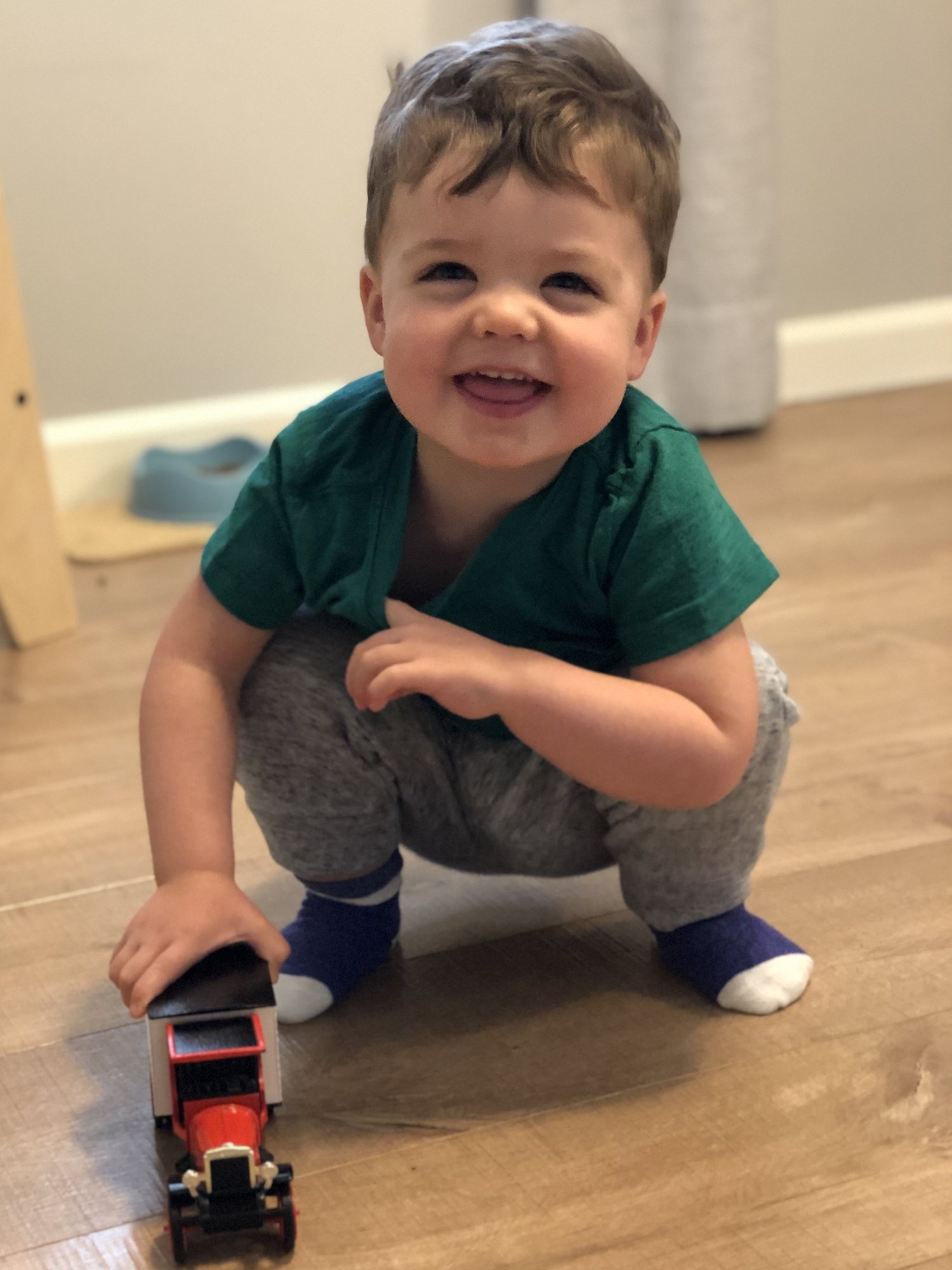 Playing with a truck that belonged to his Grandpa Jim.