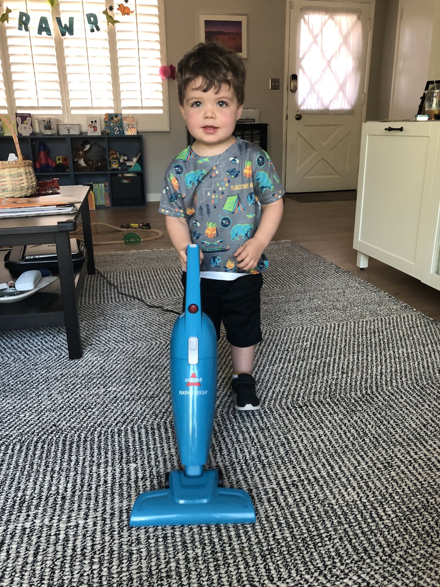 His very own vacuum!!! Thank you Auntie Nika!!!