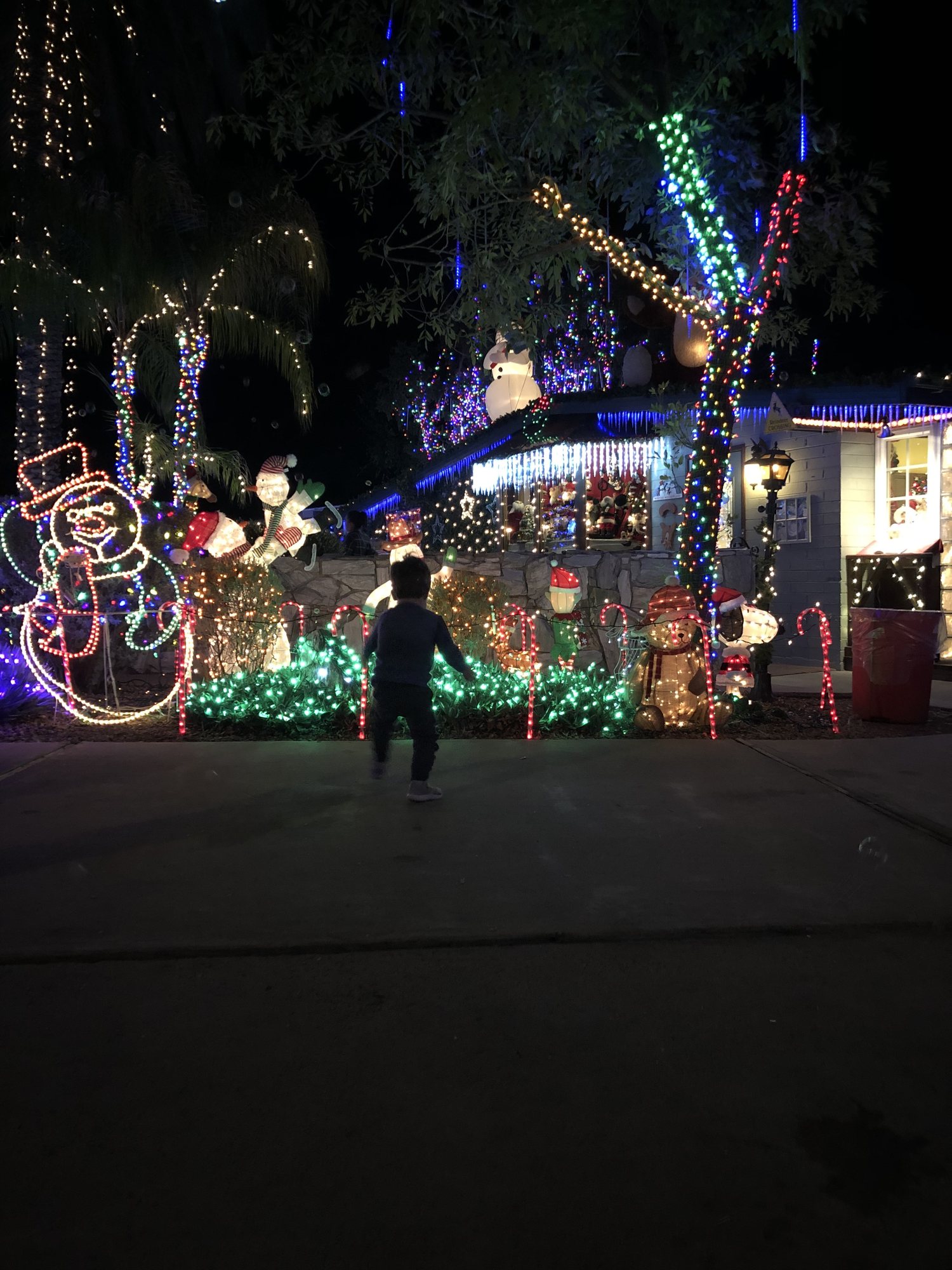 Chasing bubbles at the Arcadia Christmas House :)