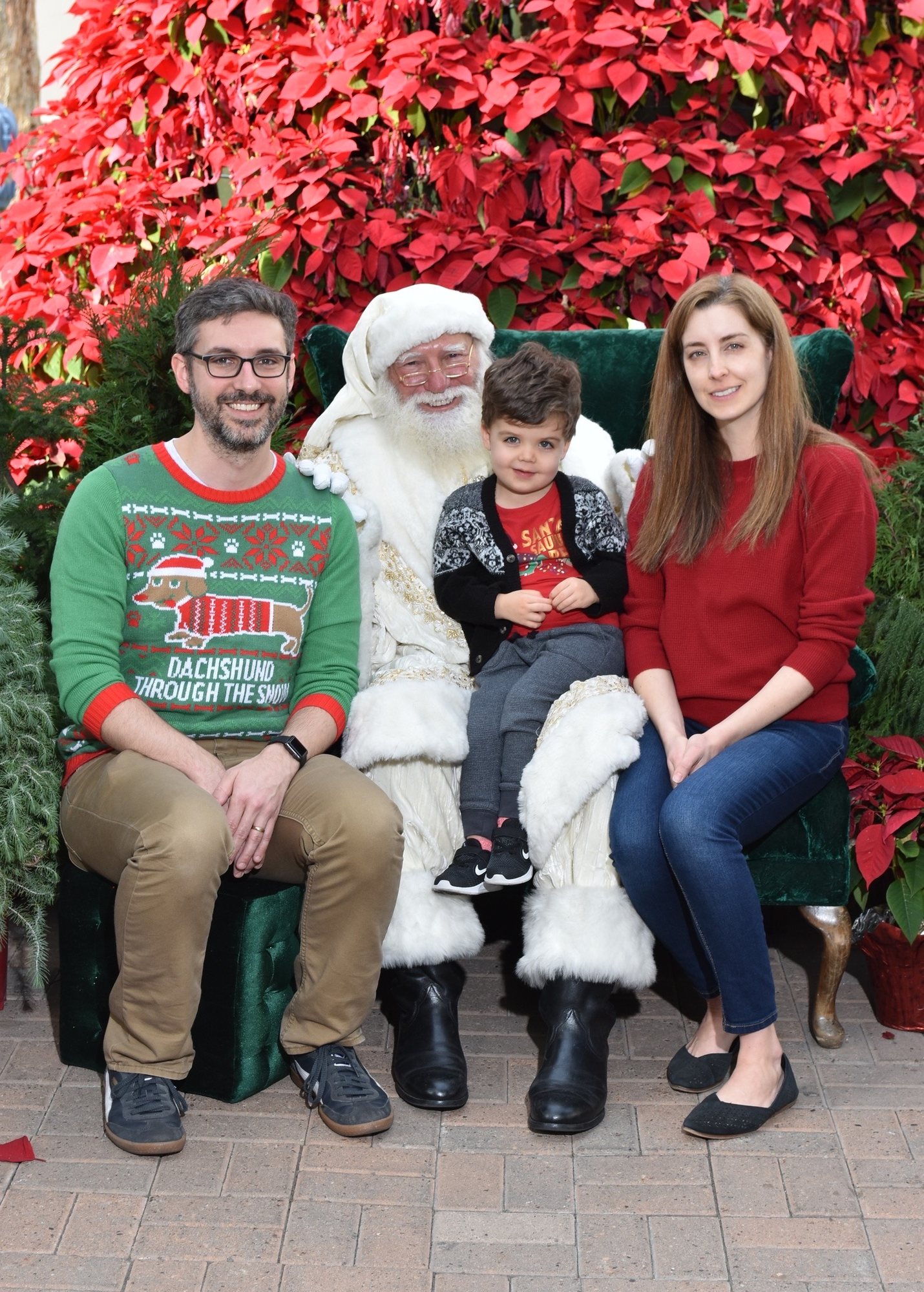 This is seriously the best Santa. He spent some time reading to Ben before taking pictures.