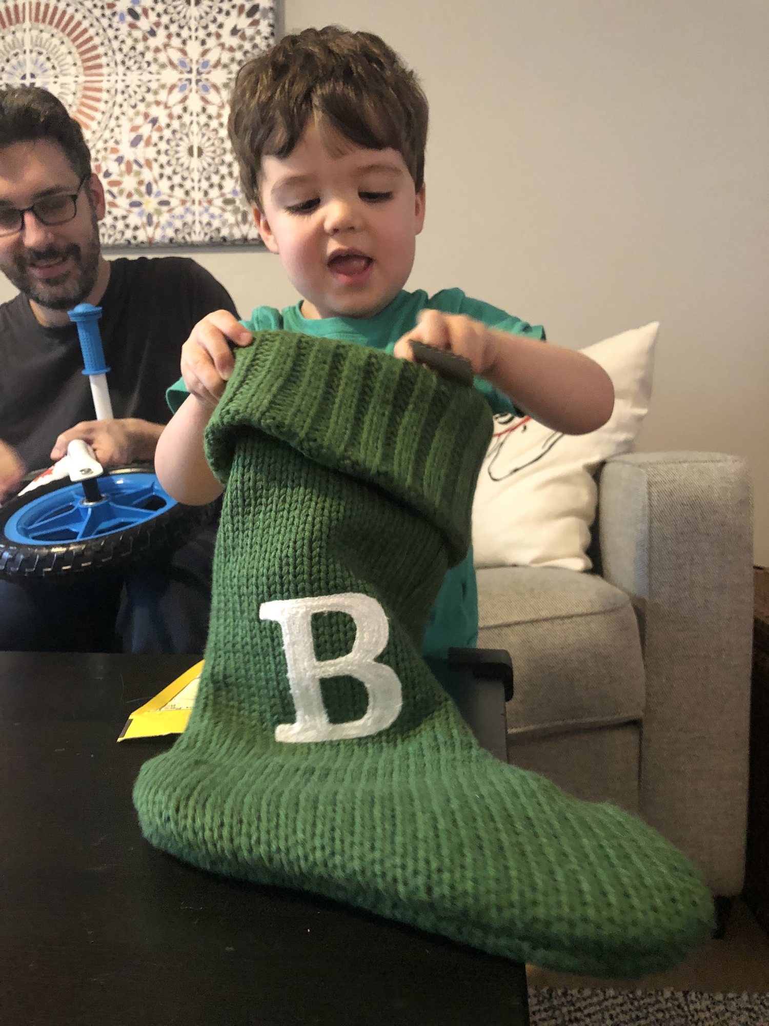 First inkling that there are presents in store for him.