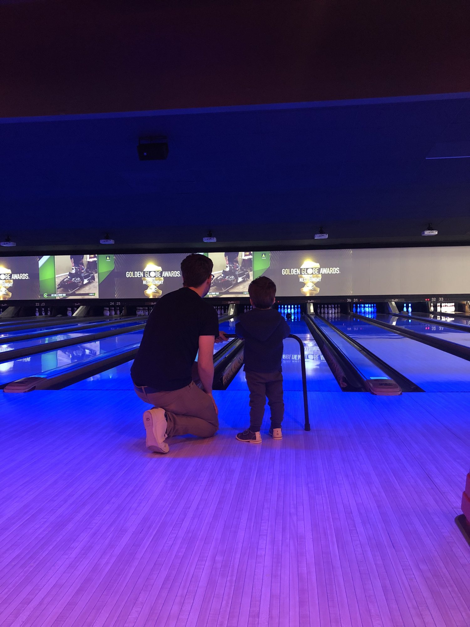Bowling with Dad. Look at those teenie bowling shoes!!!