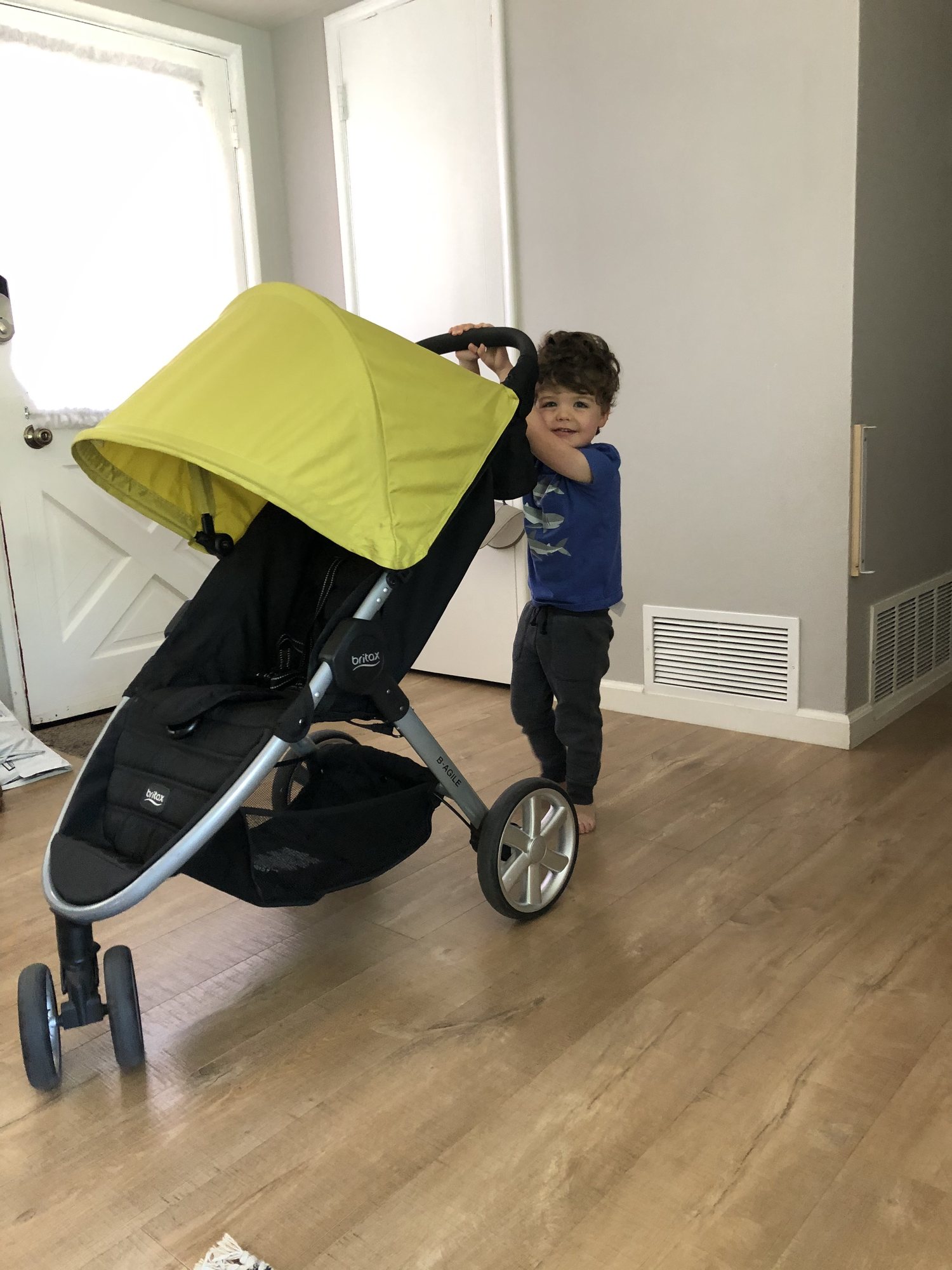 Practicing for the arrival of baby sister.