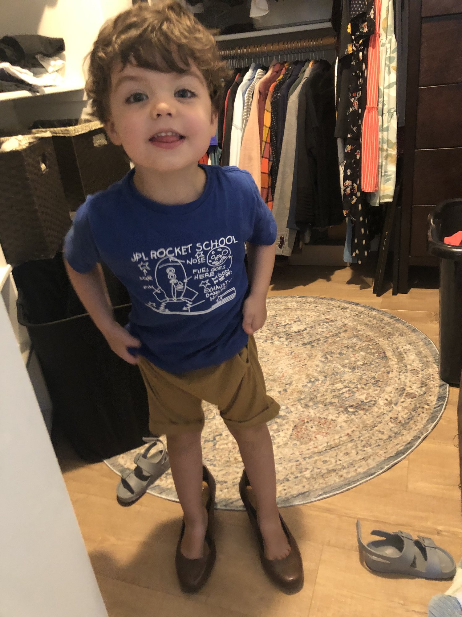 One of Ben's favoring activities - trying on mom's shoes! He looks fabulous :)