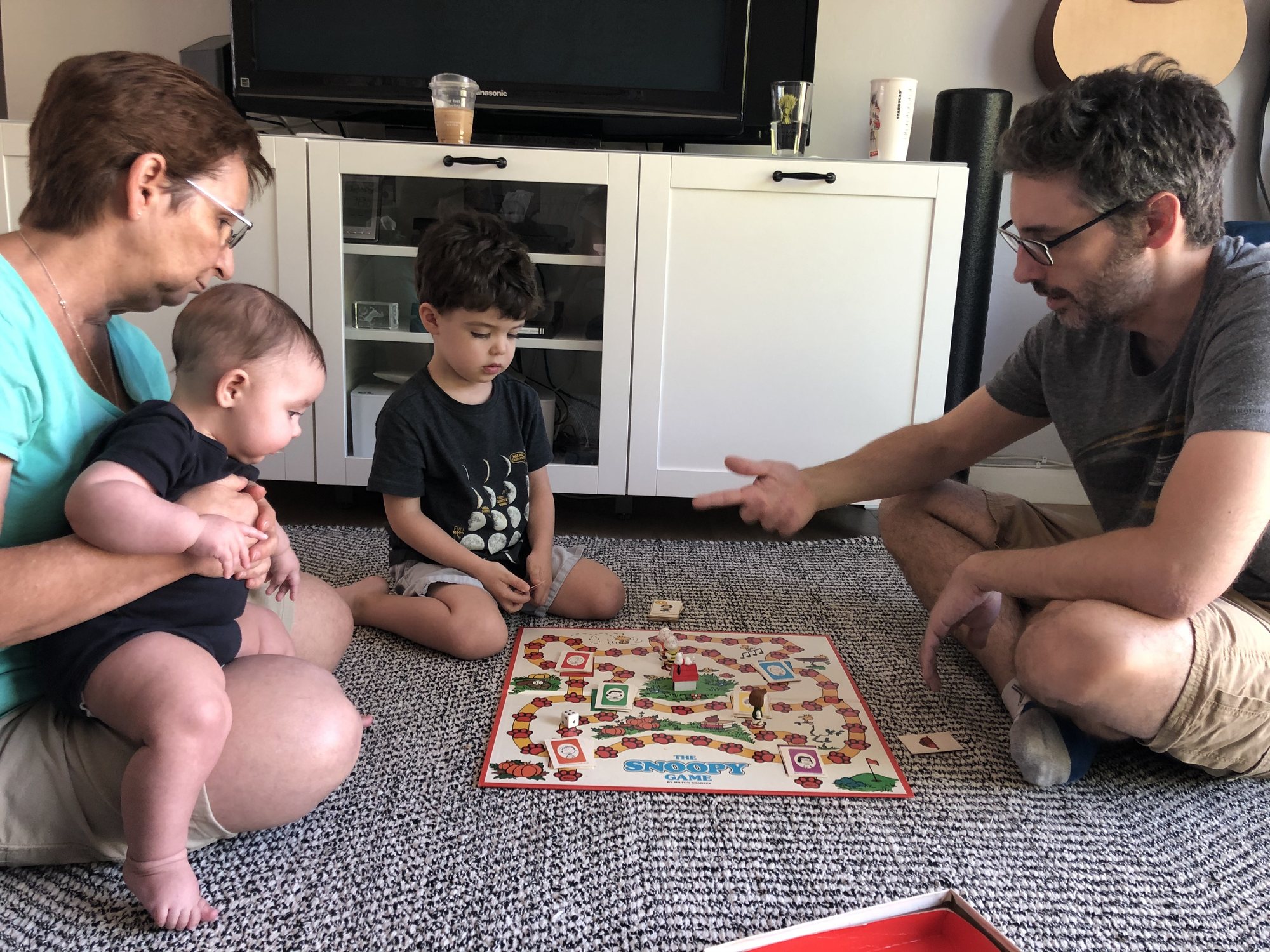 Playing a vintage Snoopy game with Nonna.