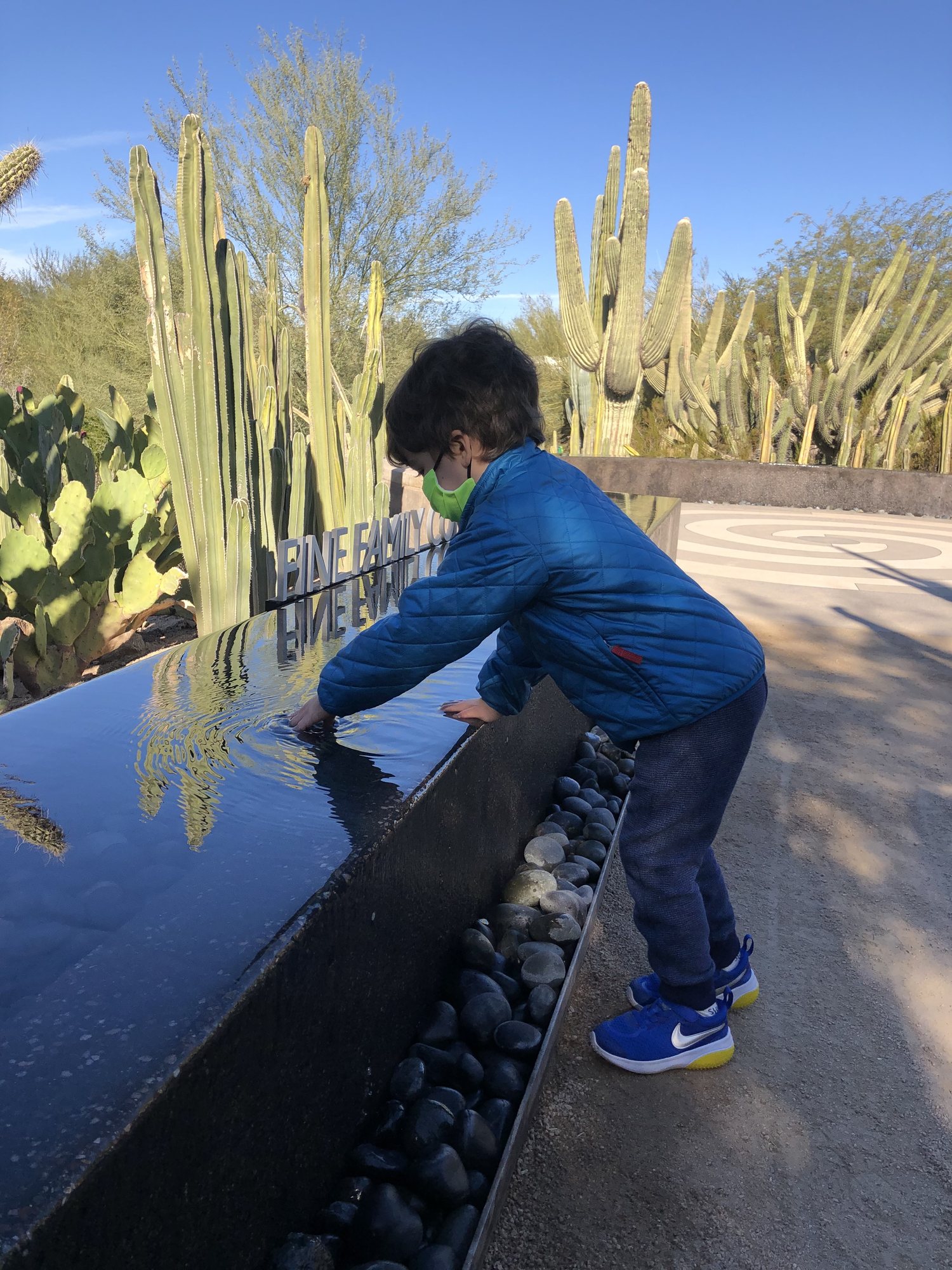 Ben can't resist the water feature.