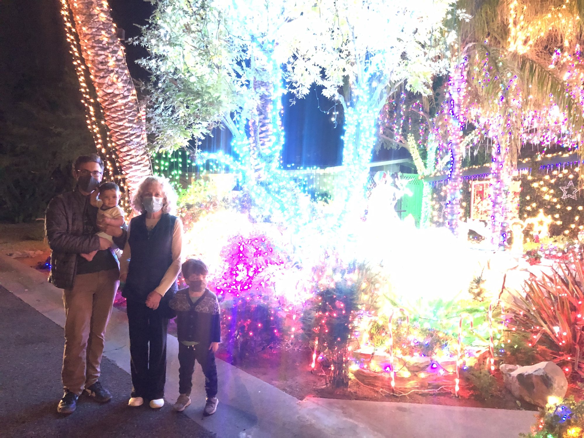 Checking out the awesome holiday lights at a house near our neighborhood.