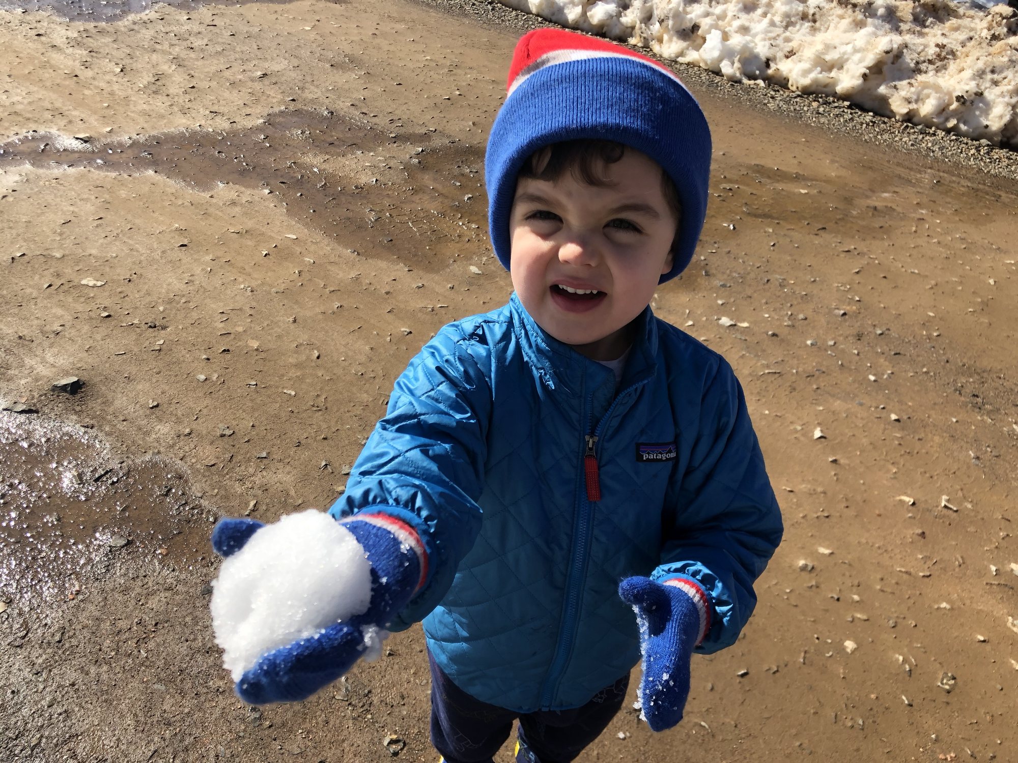 Ben makes a snowball