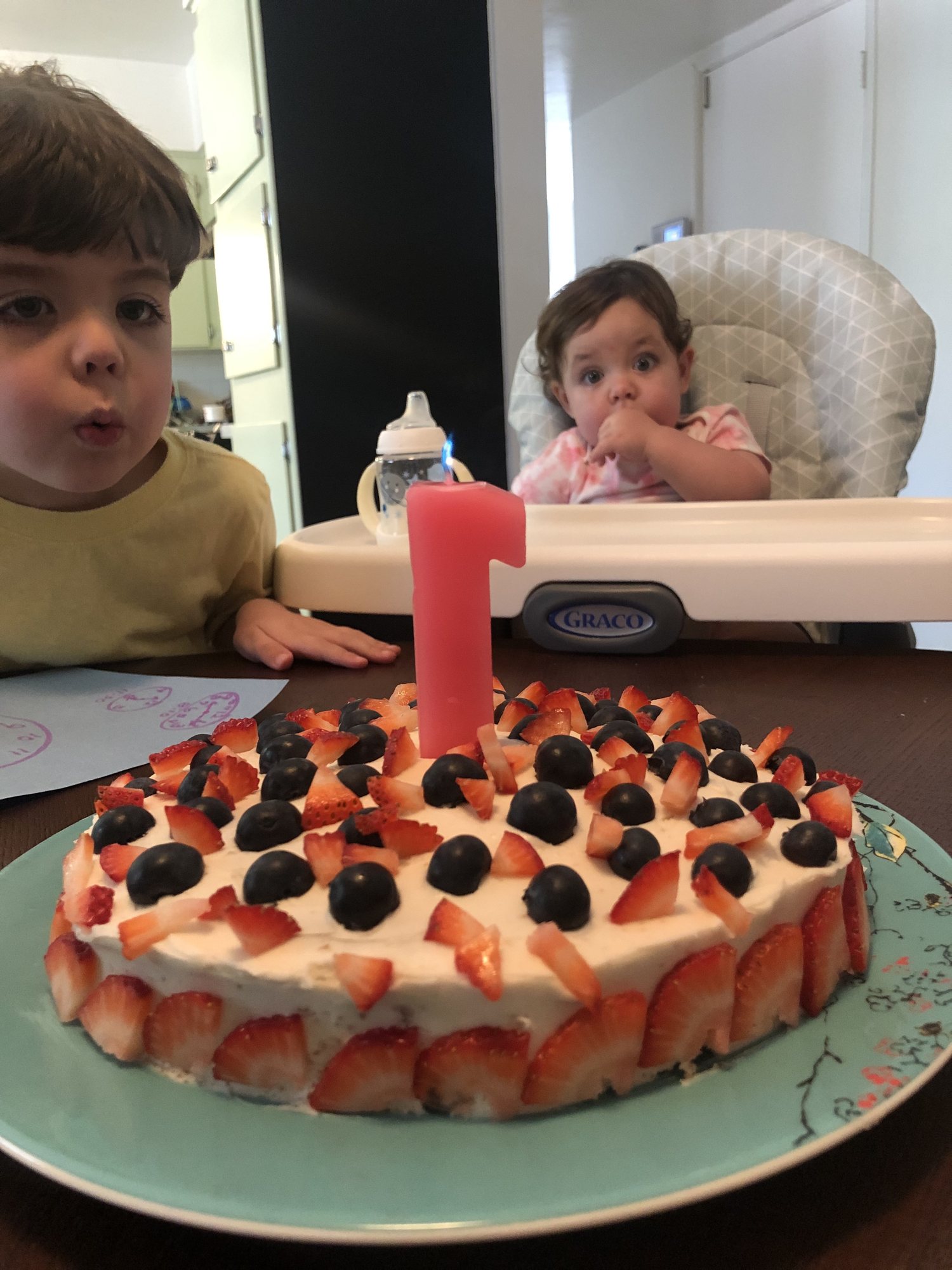 Sleepy Nora and her birthday cake.