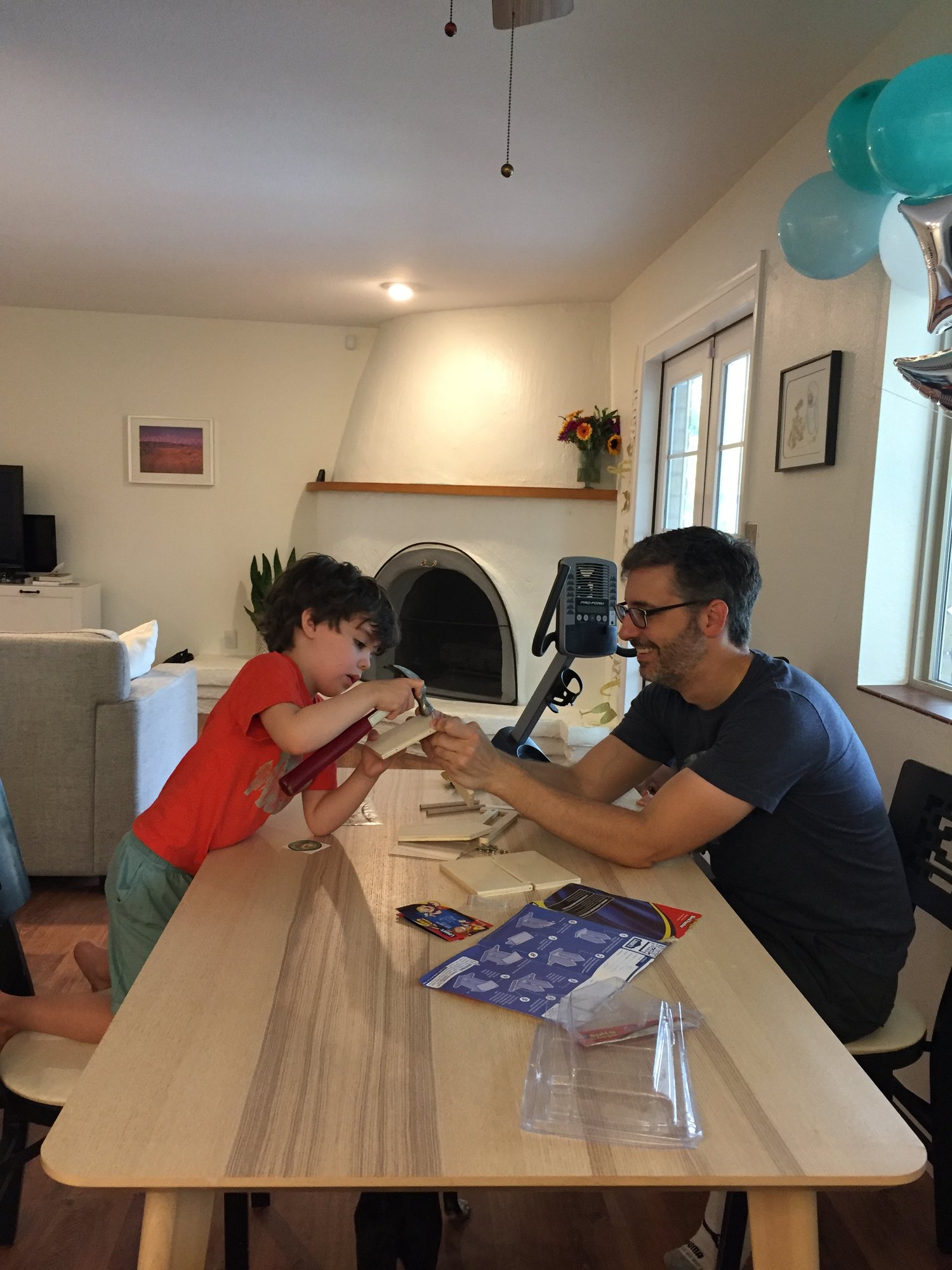 Ben and Craig making a bird feeder (or bird restaurant, as Ben calls it).