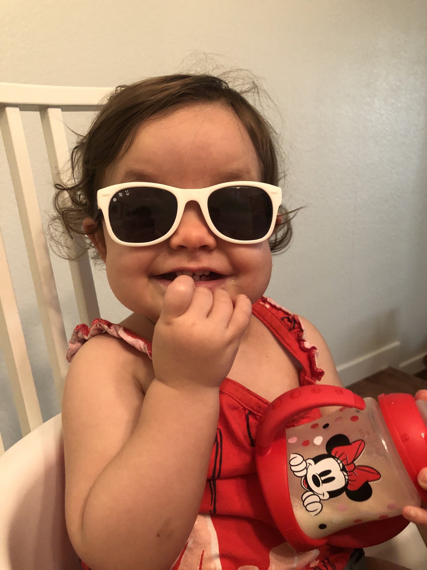 Trying out her sunglasses :)