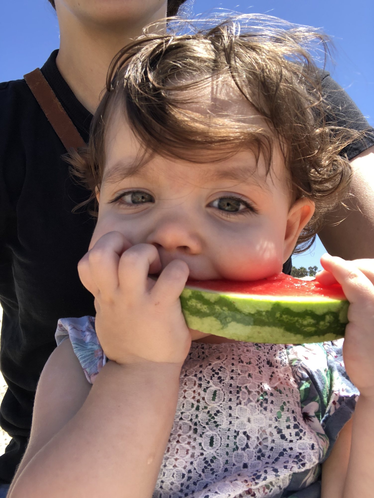 Mmmmmm... watermelon on the beach - courtesy of Auntie Nika.