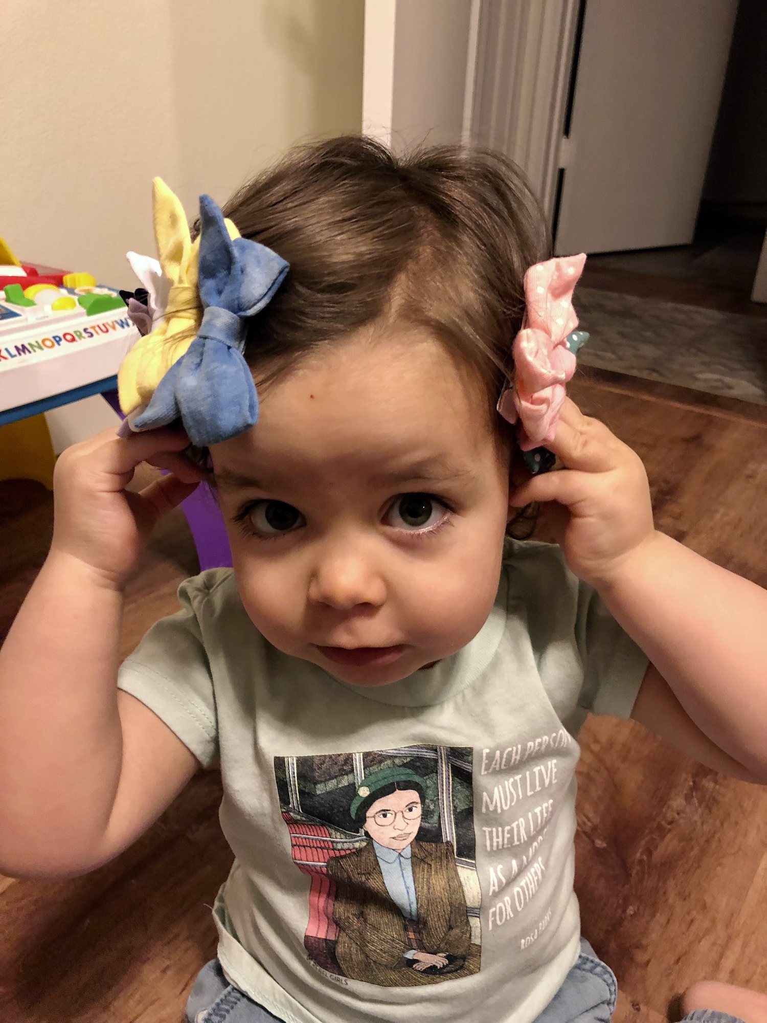 Nora wants to know if she has enough bows in her hair.