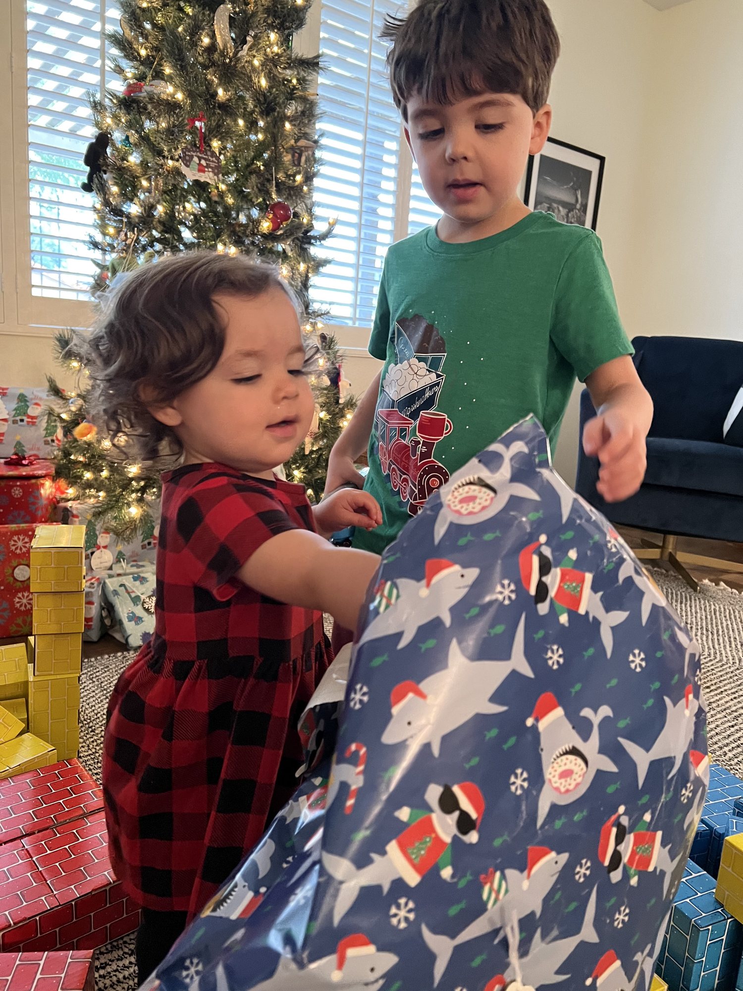 Helping Nora open her present