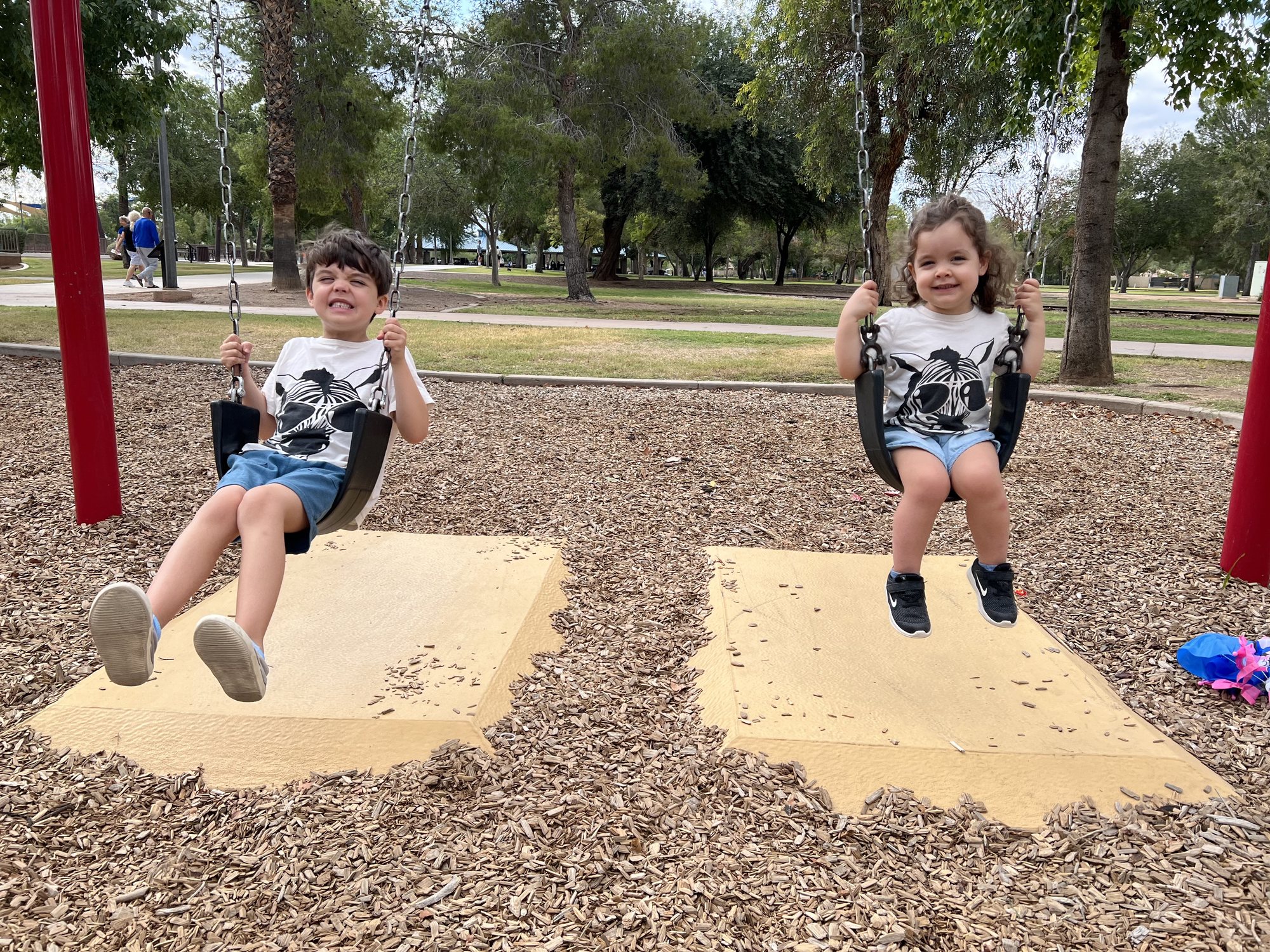 Fun morning at the park riding bikes/scooters and playing on the playground.