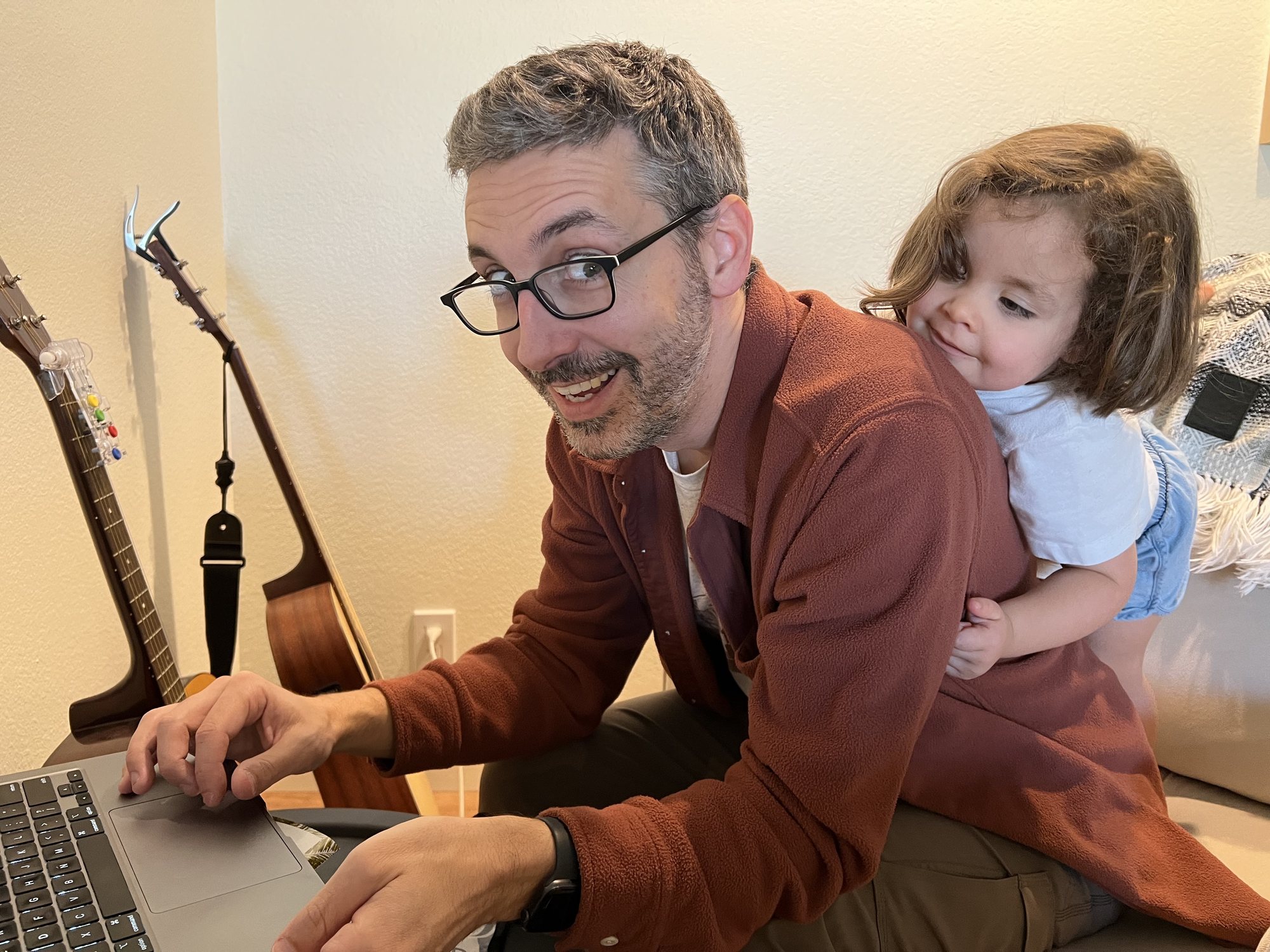 "Helping" dad work.