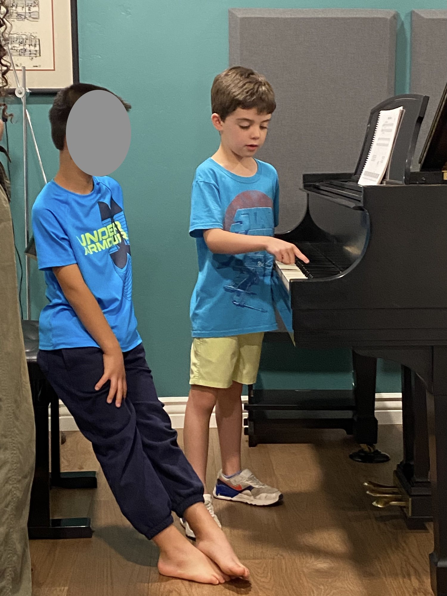 Piano lesson with Ben's bestie.