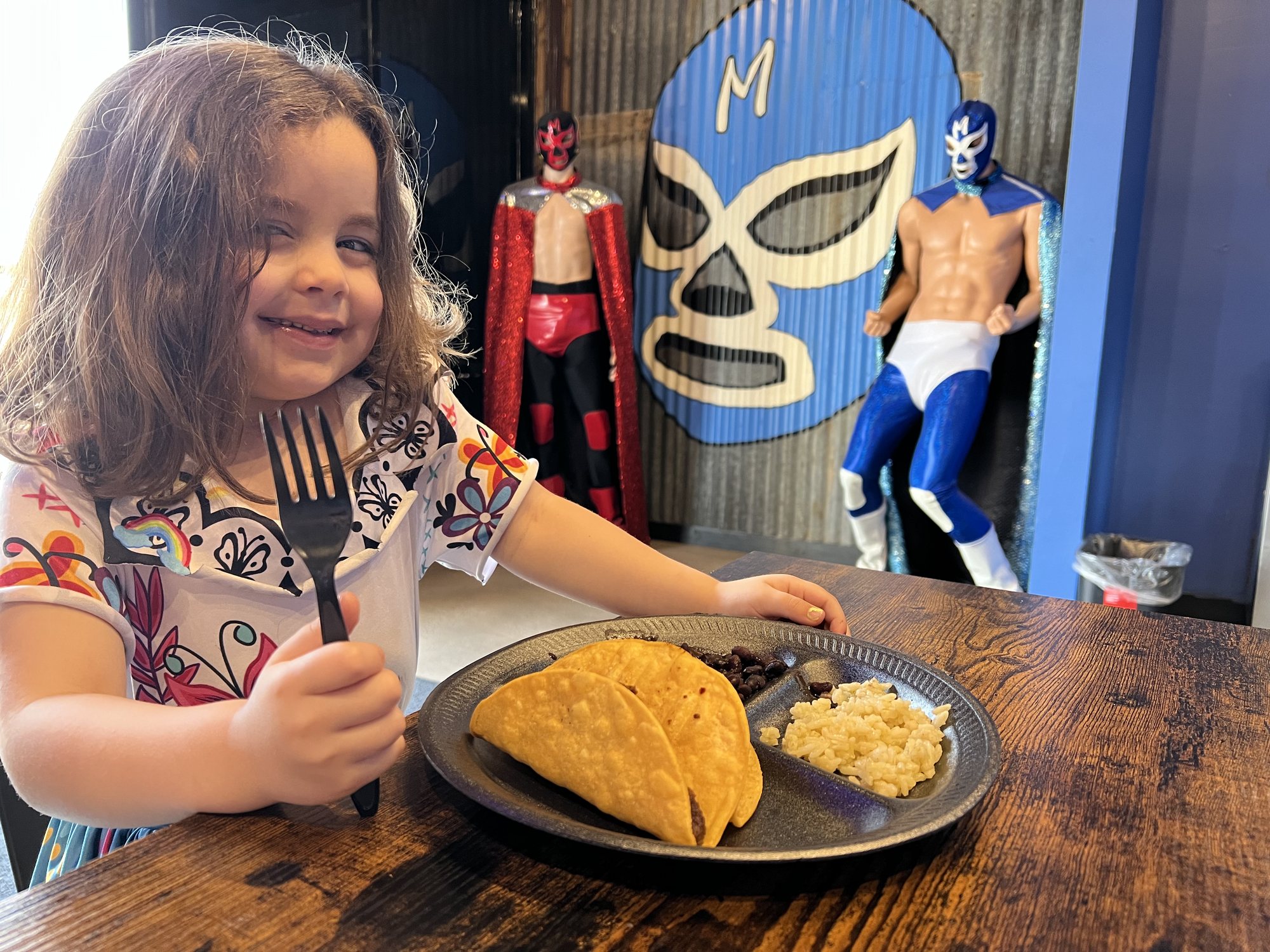 Lunch with my girl and some highly inappropriate luchadores (LOL).