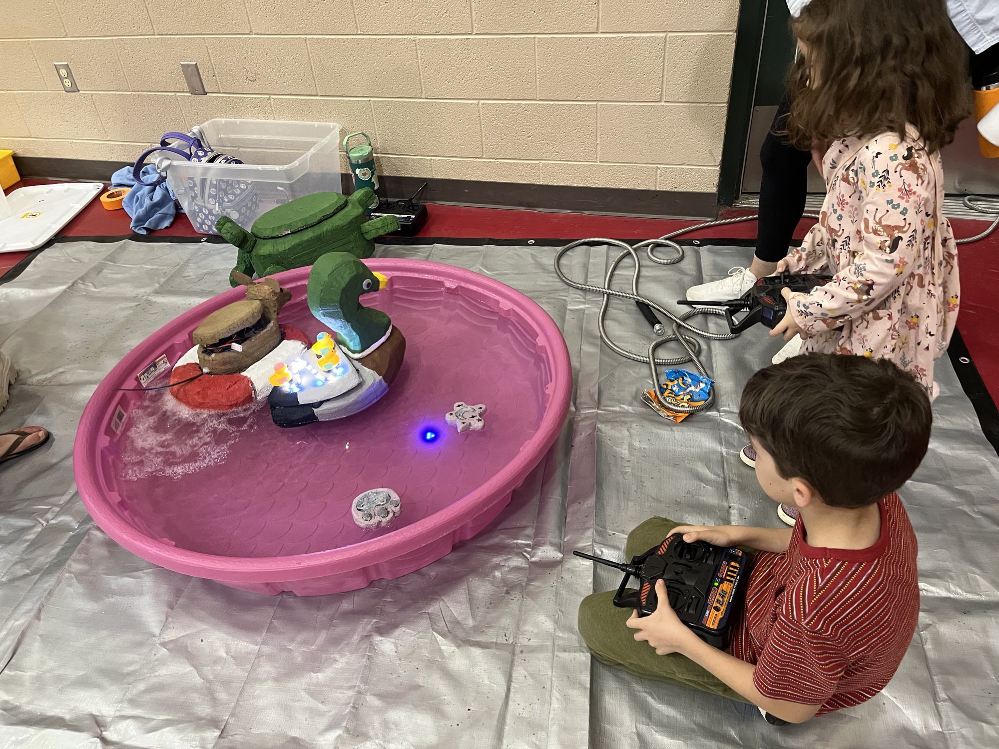 Steering boats at STEM night at Ben's school.