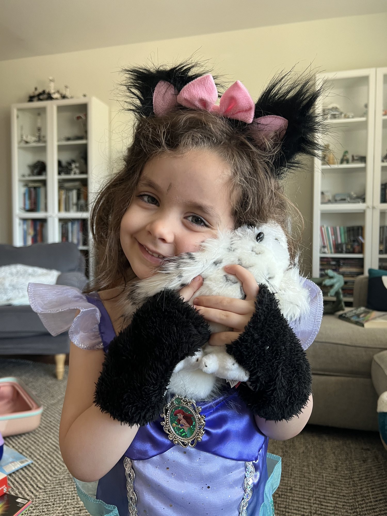 Just a mermaid kitty-girl snuggling with Hedwig.