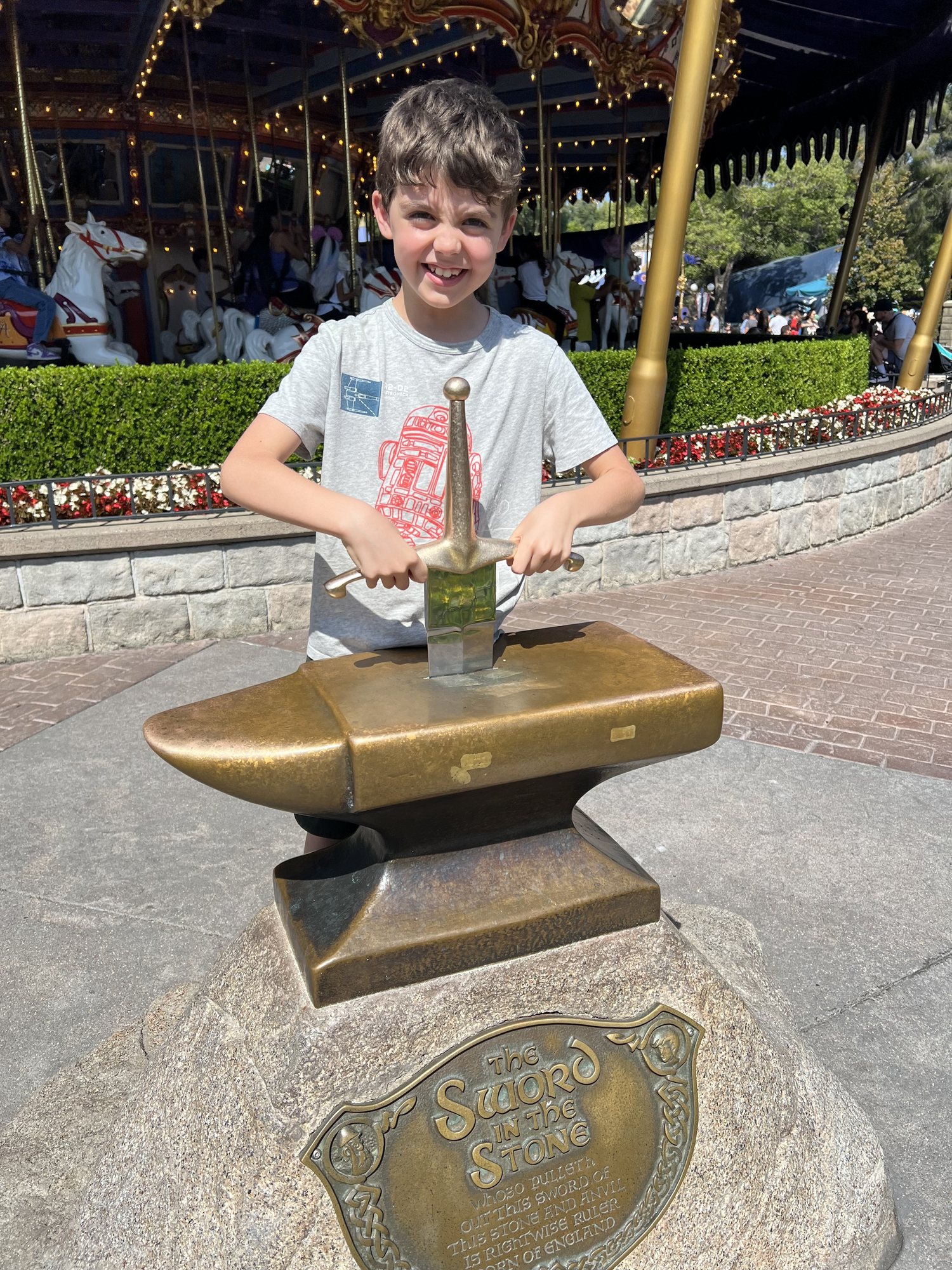 Ben tries to liberate the sword in the stone.